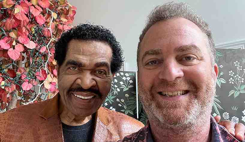 bobby rush selfie with ric steward in front of floral background